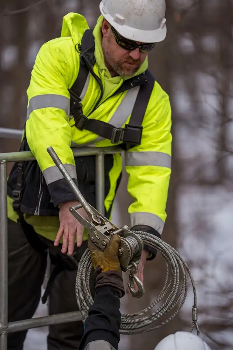 G2 Tree Services - arborist handing tree cabling and bracing tools